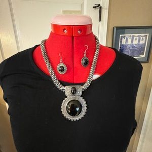 Costume jewelry set of necklace and earrings. Black stone on silver tone.